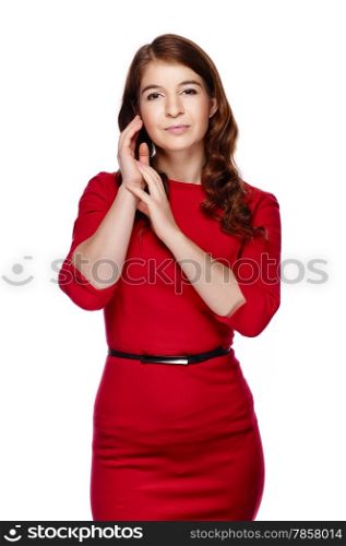 Attractive young adult woman wearing red dress and she looking at camera - white background