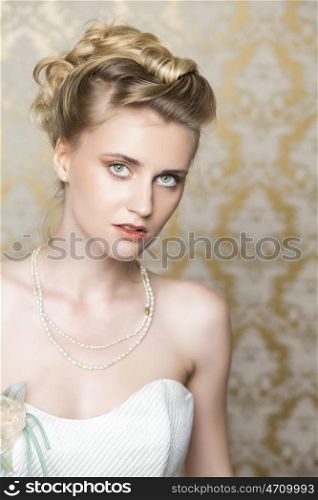 Attractive young bride with beautiful wedding hairstyle