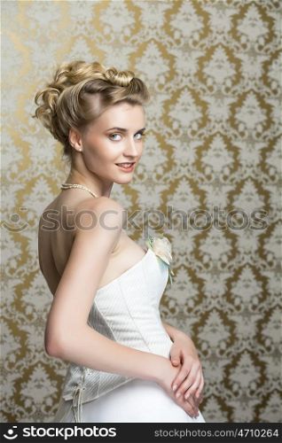 Attractive young bride with beautiful wedding hairstyle
