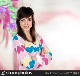 Attractive young casual girl with a pink and flowered background