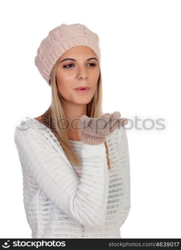 Attractive young caucasian woman in warm clothing in studio isolated on white smiling