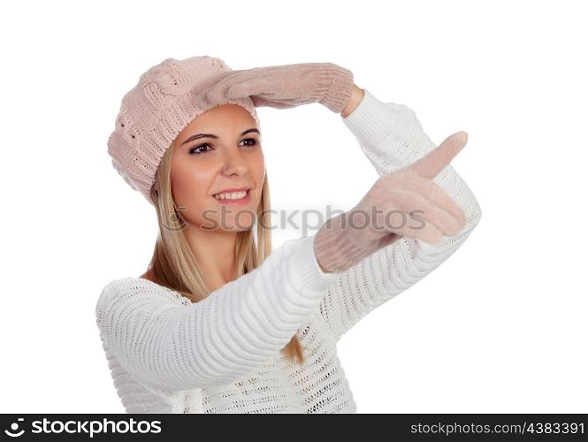 Attractive young caucasian woman in warm clothing pointing something isolated on white smiling