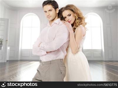 Attractive young couple in the luxury apartment