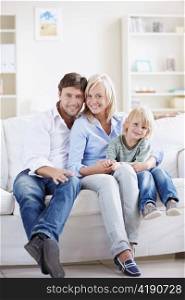 Attractive young family with a child at home