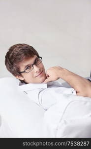 Attractive young man on the couch