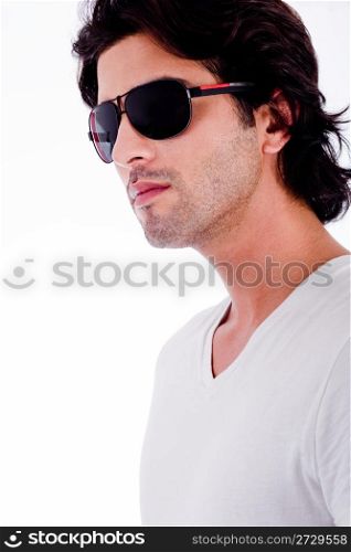 attractive young man wearing sunglass in isolated white backround