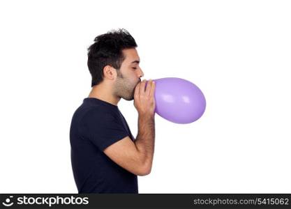 Attractive young men swelling a purple balloon isolated on white background