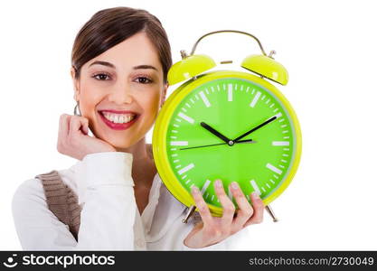 attractive young model smiling and holding the clock on white background