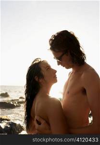 Attractive Young Topless Couple Embracing