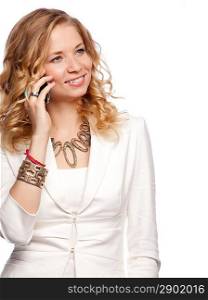 attractive young woman calling by cellular phone in white suit on a white background