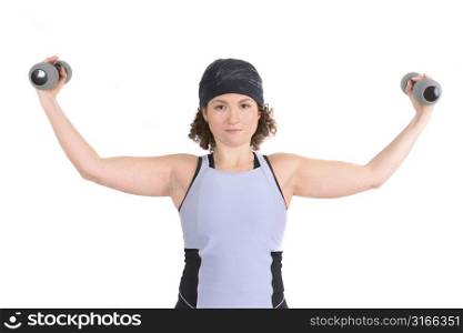 Attractive young woman doing biceps curls