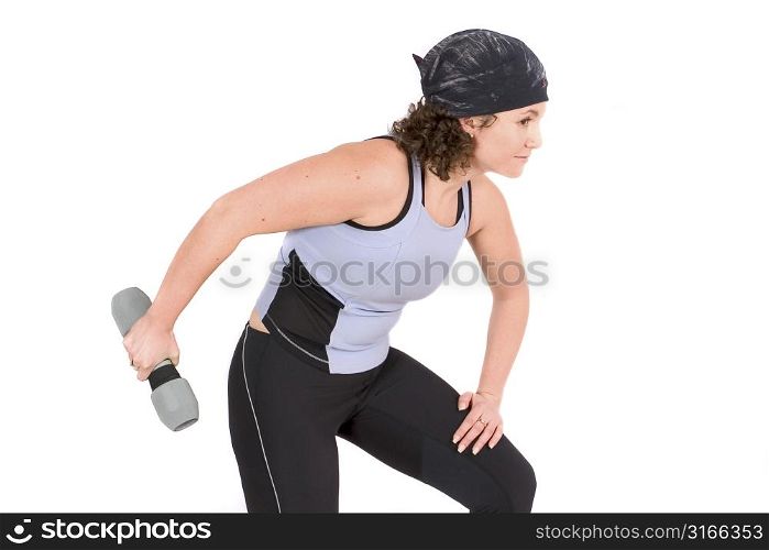 Attractive young woman doing triceps excercise