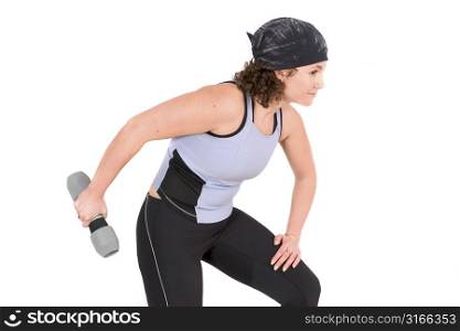 Attractive young woman doing triceps excercise