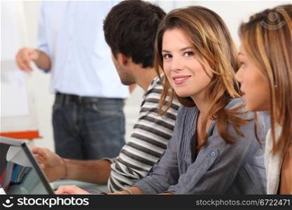 Attractive young woman in a meeting