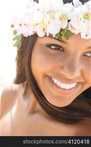 Attractive Young Woman in Lei Smiling