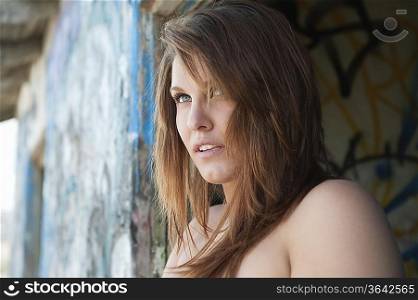 Attractive young woman looking away