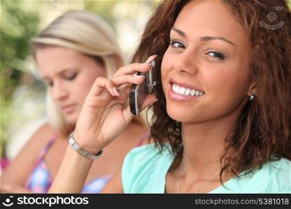 Attractive young woman on a cellphone