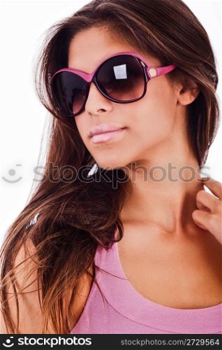 attractive young woman wearing sunglasses on isolated white background
