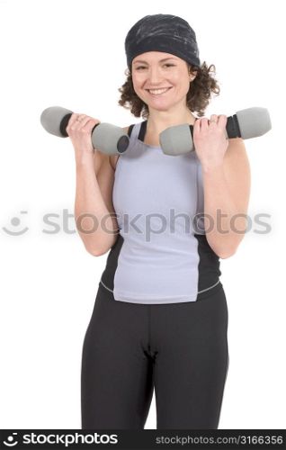 Attractive young woman with dumbbels