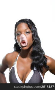 Attractive Young Woman with Popped Bubble Gum