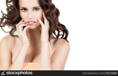 Attractive young woman with very fresh skin and beautiful brown hair in towe