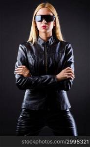 Attrative woman in leather suit
