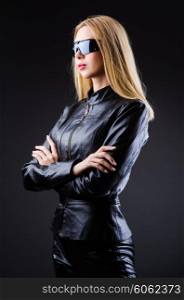 Attrative woman in leather suit