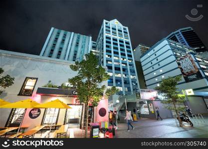 AUCKLAND, NEW ZEALAND - AUGUST 26, 2018: Auckland buildings on a winter night. The city attracts 2 million tourists annually.