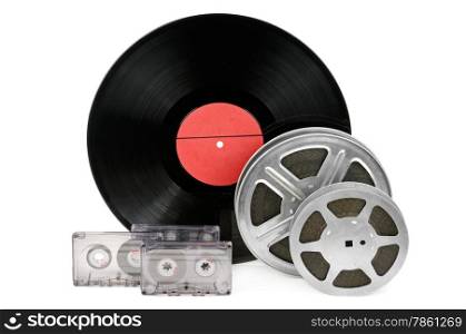 audio cassettes, records and film strip isolated on white background