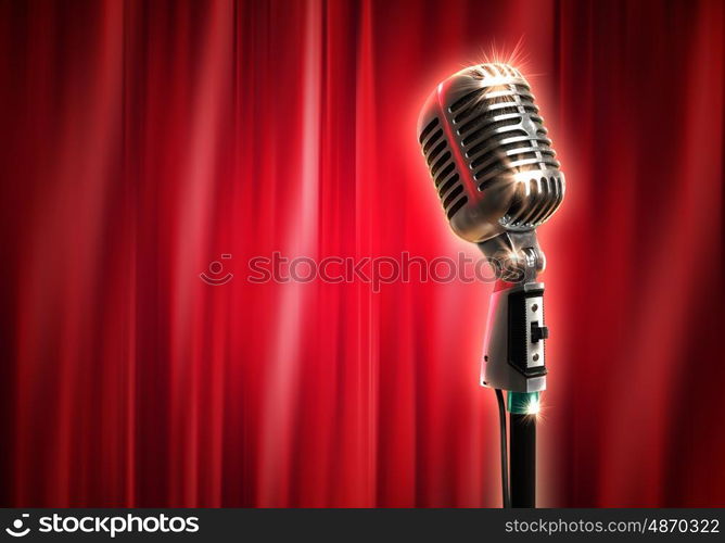 audio microphone retro style. Single retro microphone against red curtains closed on the background