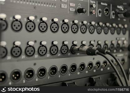 Audio mixer with balanced and unbalanced signal inputs and outputs via remote wifi control of concerts and recording studios, in rack system