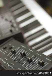 Audio Mixer With Keyboard In Studio