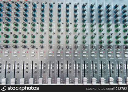 Audio sound mixer control panel top view. Sound console buttons for adjust the volume