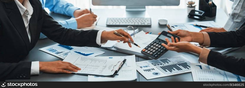 Auditor and accountant team working in office, analyze financial data and accounting record with calculator. Accounting company provide finance and taxation planning for profitable cash flow. Insight. Accounting company provide finance and taxation for profit income. Insight