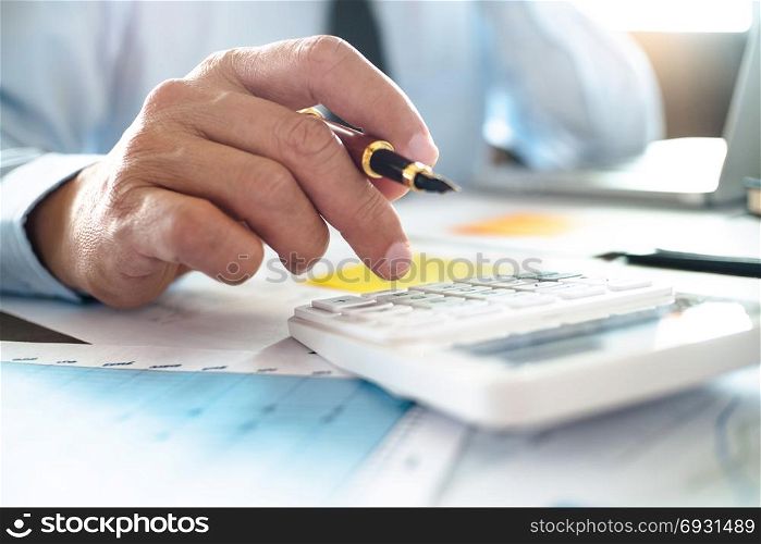 auditor or financial inspector working on business report