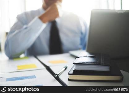 auditor or financial inspector working on business report, selective focus