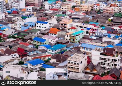 AUG 6, 2014 Hua Hin, THAILAND - Overcrowded Asian urban residental district with colourful roof and various style of buildings. Shot from aerial view
