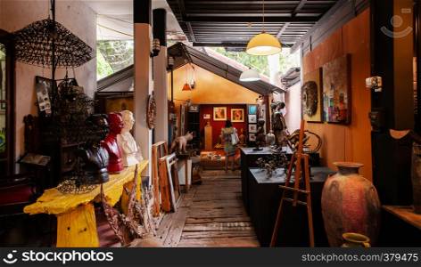 AUG 8, 2014 Hua Hin, Thailand - Oriental Asian antique arts shop - Local craft interior home decoration products