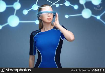 augmented reality, science, technology and people concept - beautiful woman in futuristic 3d glasses with molecule virtual projection over blue background. woman in virtual reality 3d glasses with molecules