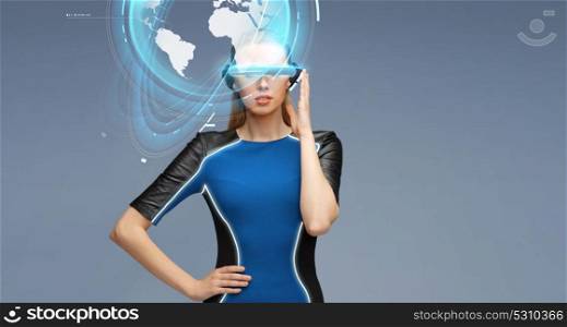 augmented reality, science, technology and people concept - beautiful woman in futuristic 3d glasses with virtual earth projection over blue background. woman in virtual reality 3d glasses with earth