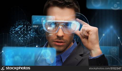 augmented reality, technology, business and people concept -businessman in virtual glasses looking at screen projections over dark background. businessman in virtual reality or 3d glasses