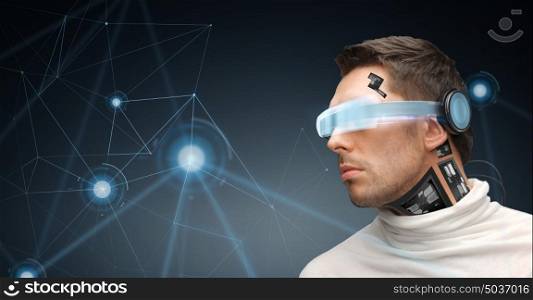 augmented reality, technology, business, future and people concept - man in virtual glasses and microchip implant or sensors over dark gray background looking at low poly network projection. man in virtual reality glasses and microchip