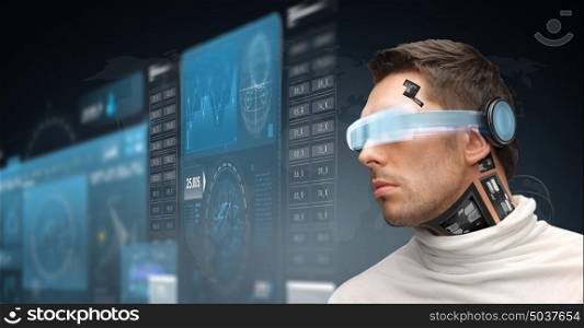 augmented reality, technology, business, future and people concept - man in virtual glasses and microchip implant or sensors looking at screen projections over dark background. man in virtual reality glasses and microchip