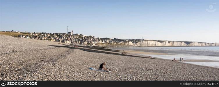 Ault, France, 5 august 2020: people walk on beach near Ault on the coast of french normandy