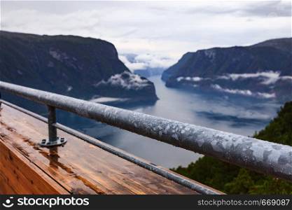 Aurlandsfjord landscape from Stegastein viewing point, clouds over sea water surface. Norway Scandinavia. National tourist route Aurlandsfjellet.. Fjord landscape at Stegastein viewpoint Norway