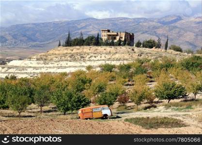 Aurumn orchard and car in Bekaa valley in Lebanon