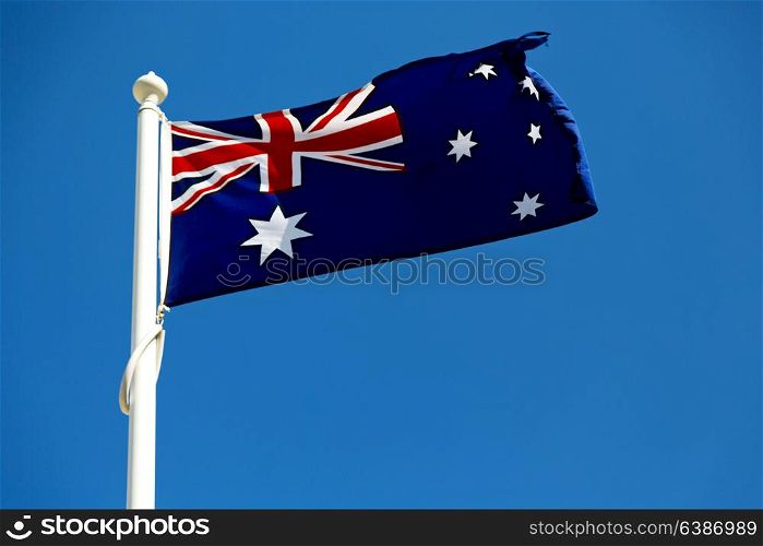 australia in the clear sky the waving flag