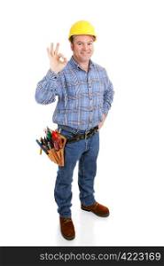 Authentic construction worker giving the a-okay sign with his fingers. Full body isolated on white.