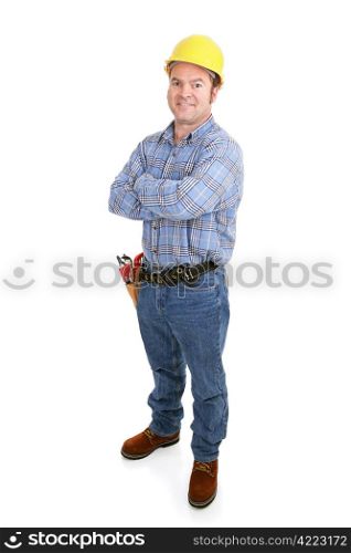 Authentic construction worker smiling with arms crossed. Isolated on white.