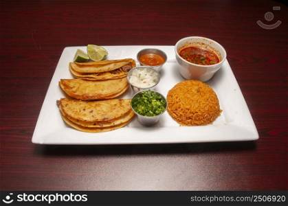 Authentic tex mex mexican cuisine known as Birria Tacos With Consomme